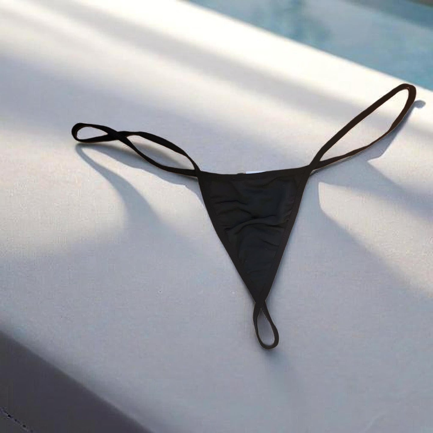 Pantie tanga satinada negra
